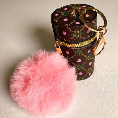 PORTE ROUGE À LÈVRE ET PORTE-CLÉ.