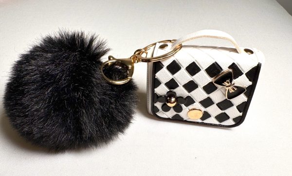 WhatsApp Image 2025-11-01 at 23.19.53 PORTE ÉCOUTEUR ET PORTE-CLÉ.