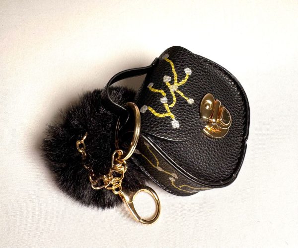 PORTE ÉCOUTEUR ET PORTE-CLÉ.