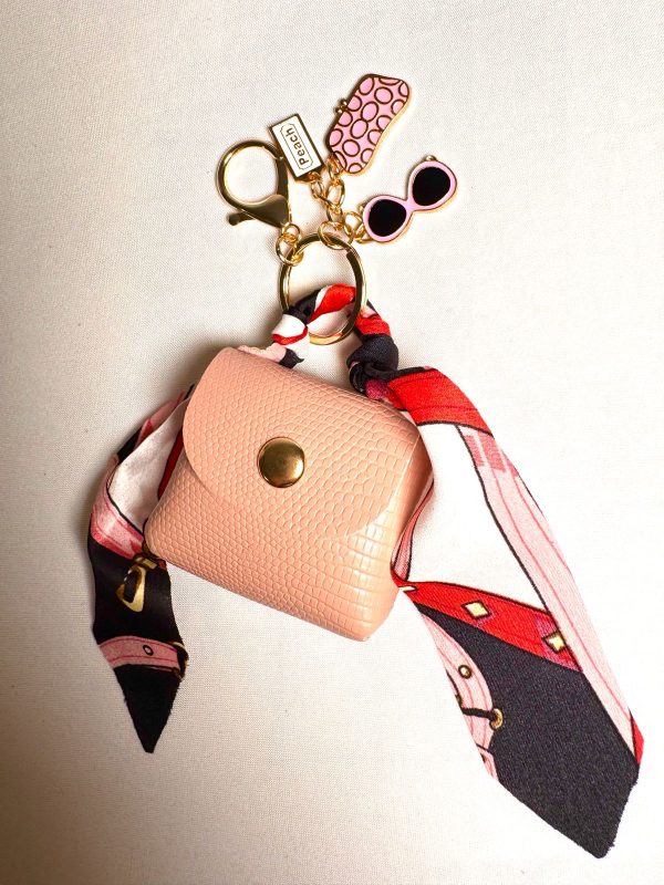 WhatsApp Image 2025-11-01 at 23.21.41 PORTE ÉCOUTEUR ET PORTE-CLÉ.