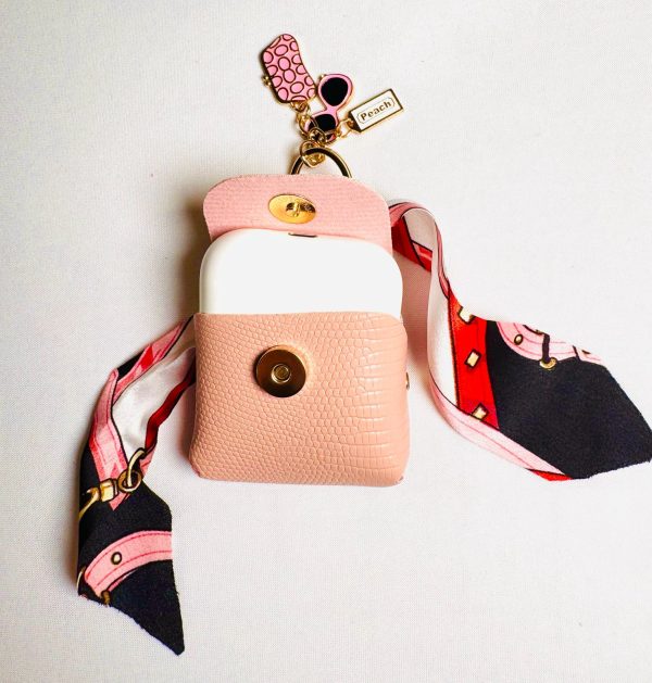 WhatsApp Image 2025-11-01 at 23.21.42 (2) PORTE ÉCOUTEUR ET PORTE-CLÉ.